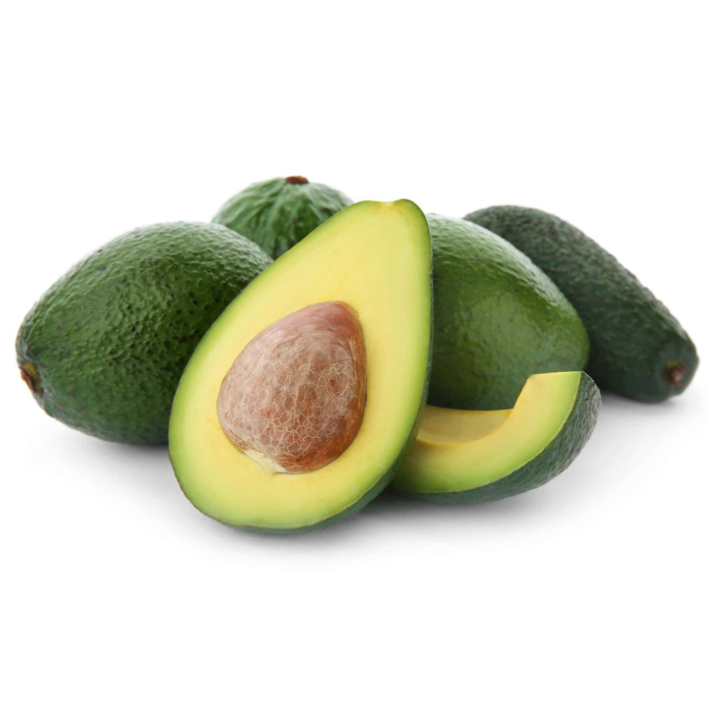 Whole and sliced ripe avocados showcasing creamy green flesh and large seed